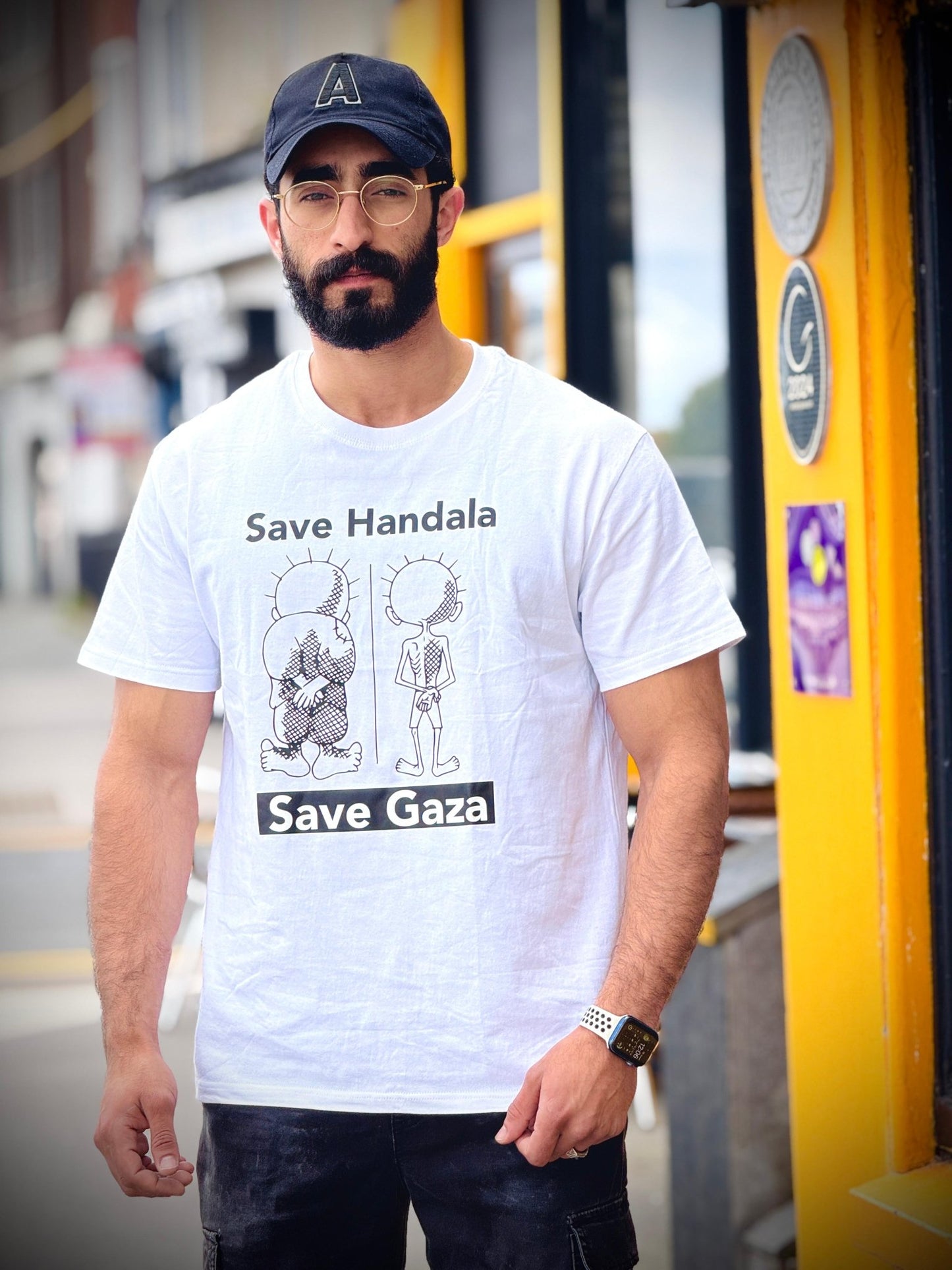 Save Handala T-Shirt – Support Gaza Relief | 100% Profits Donated to Feed Families in Gaza - Izz Cafe