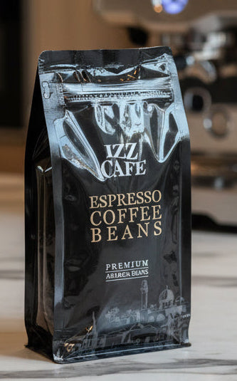 Packaged espresso coffee beans with 'Izz Cafe' branding on a white background